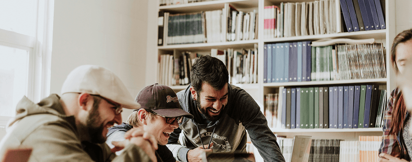 Students studying together in a library